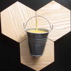 Beeswax candle in grey bucket